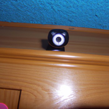 Est-ce que je peux recueillir des informations avec un bouton de chemise espion ?